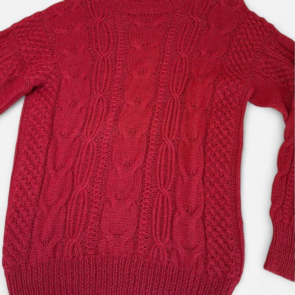 Red cable knit sweater with long sleeves